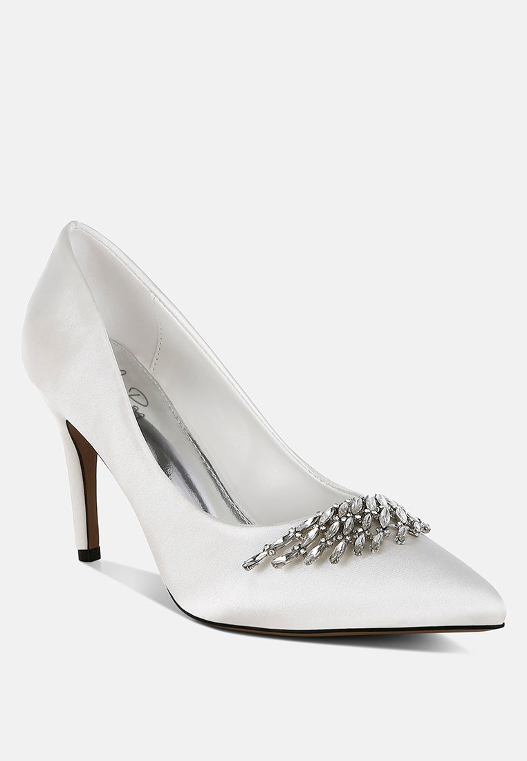 White Diamante Brooch Detail Satin Pumps by London Rag – satin pointed-toe pumps with a diamante brooch detail, stiletto heel, and cushioned insole, side profile view
