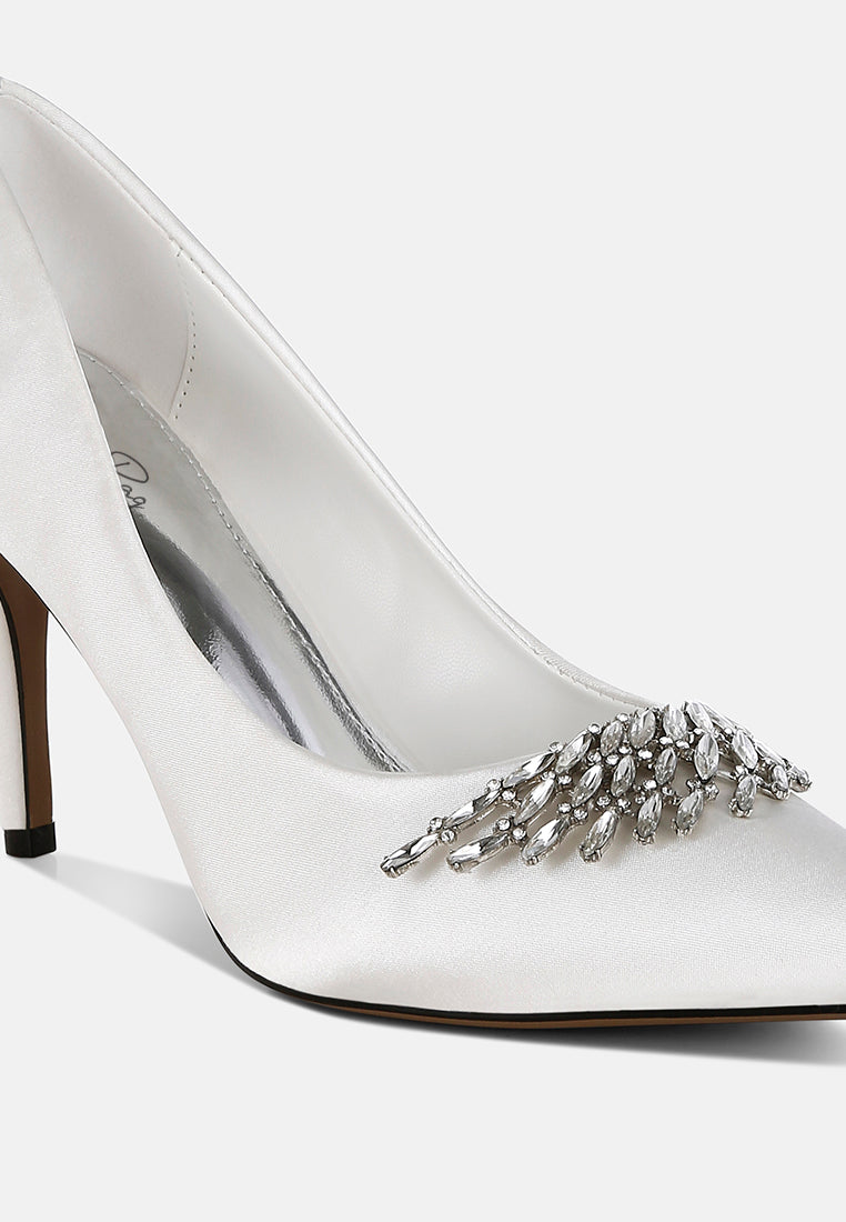 White Diamante Brooch Detail Satin Pumps by London Rag – satin pointed-toe pumps with a diamante brooch detail, stiletto heel, and cushioned insole, sole and heel view