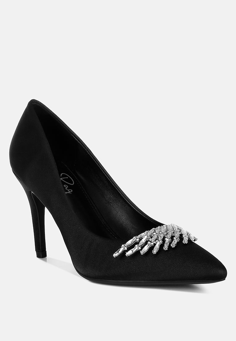 Black Diamante Brooch Detail Satin Pumps by London Rag – satin pointed-toe pumps with a diamante brooch detail, stiletto heel, and cushioned insole, side profile view