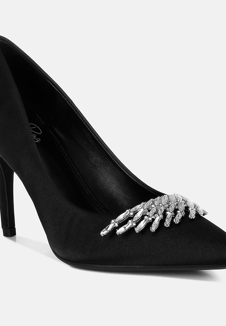 Black Diamante Brooch Detail Satin Pumps by London Rag – satin pointed-toe pumps with a diamante brooch detail, stiletto heel, and cushioned insole, sole and heel view