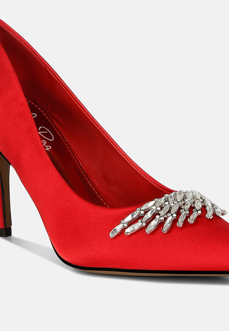 Red Diamante Brooch Detail Satin Pumps by London Rag – satin pointed-toe pumps with a diamante brooch detail, stiletto heel, and cushioned insole, sole and heel view