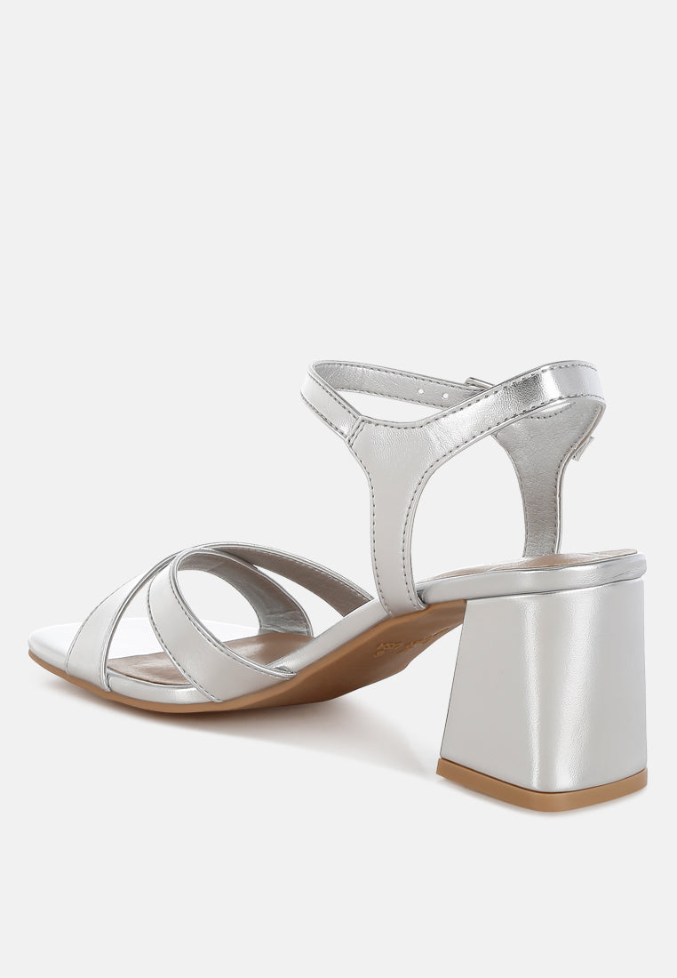 Silver Square Toe Block Heel Sandals by London Rag – square-toe block heel sandals in faux leather with an ankle strap and cushioned insole, angled view