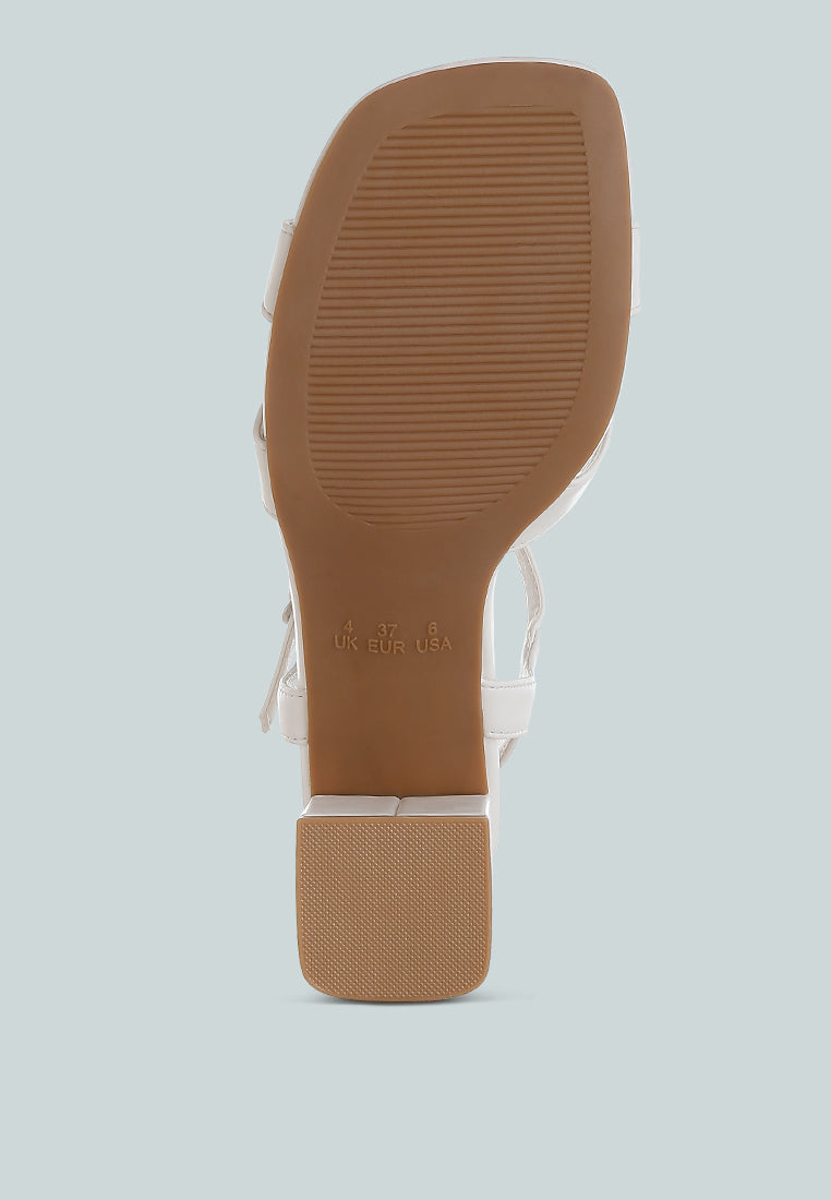 White Square Toe Block Heel Sandals by London Rag – square-toe block heel sandals in faux leather with an ankle strap and cushioned insole, styled full view