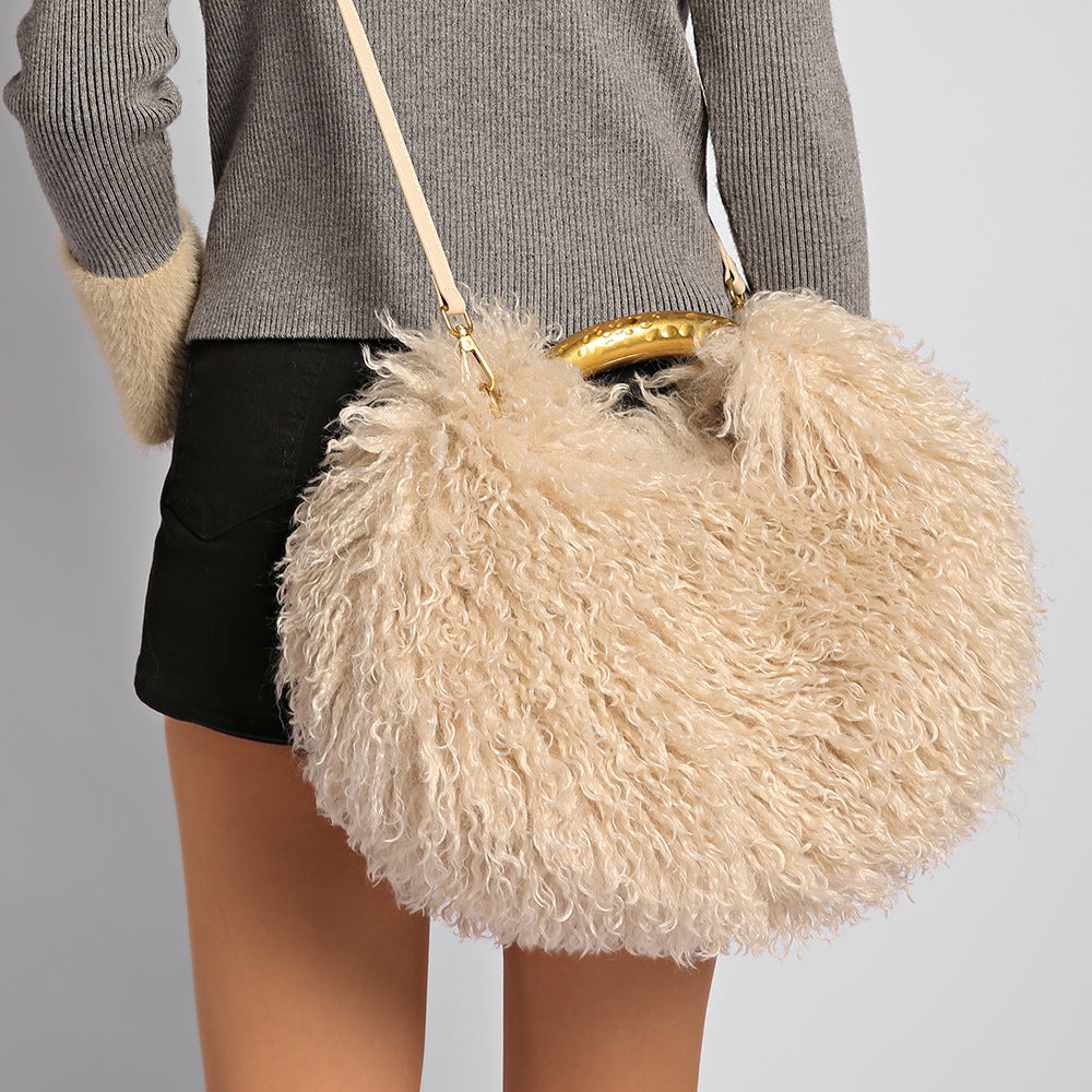 Big Fur Energy Tote worn on the shoulder