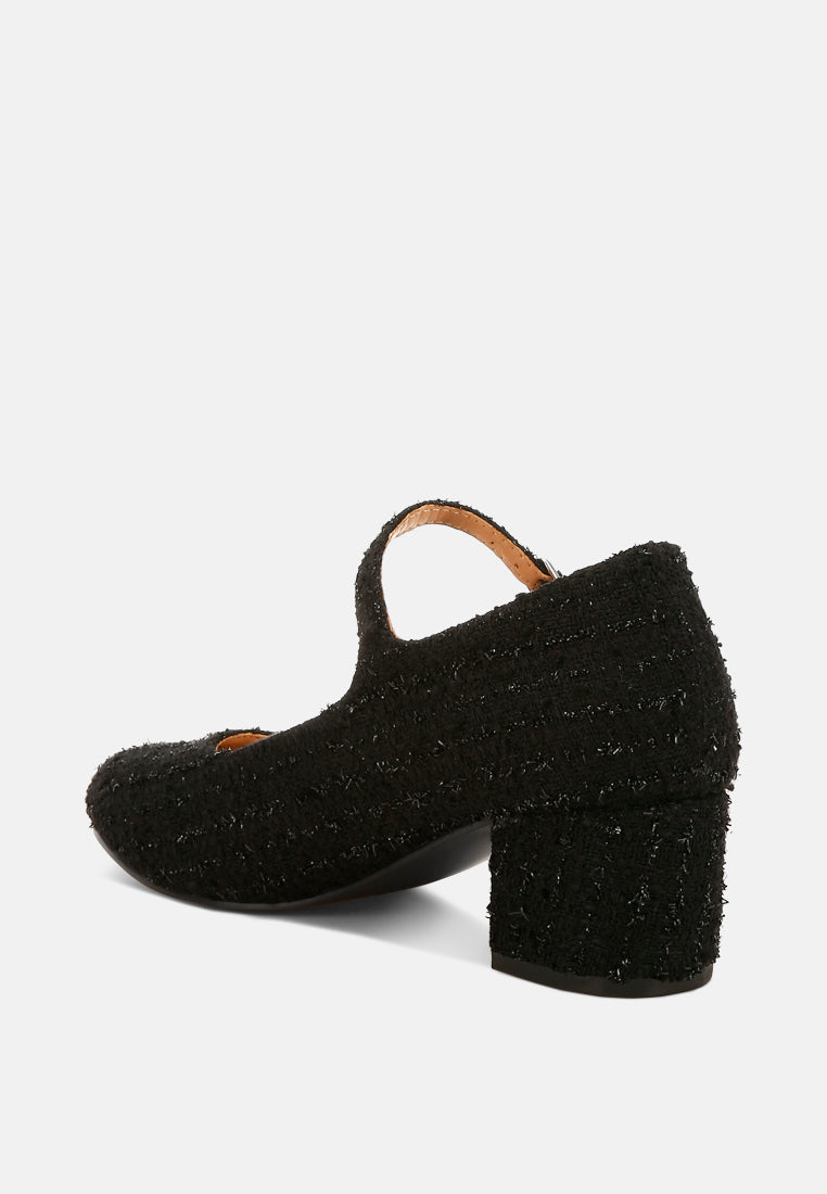 Black Tweed Mary Jane Sandals by London Rag – Mary Jane sandals with a tweed fabric upper, ankle strap, and low block heel, angled view