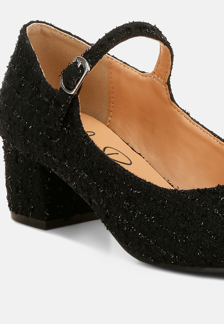 Black Tweed Mary Jane Sandals by London Rag – Mary Jane sandals with a tweed fabric upper, ankle strap, and low block heel, sole and heel view