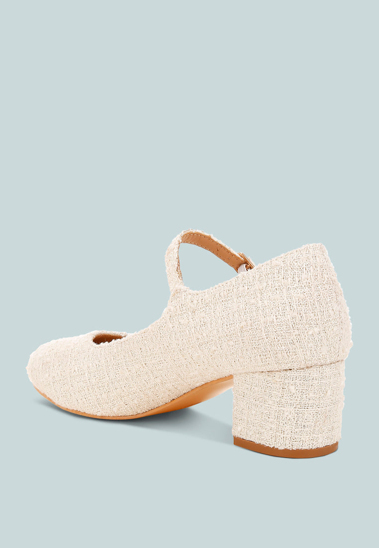 White Tweed Mary Jane Sandals by London Rag – Mary Jane sandals with a tweed fabric upper, ankle strap, and low block heel, angled view