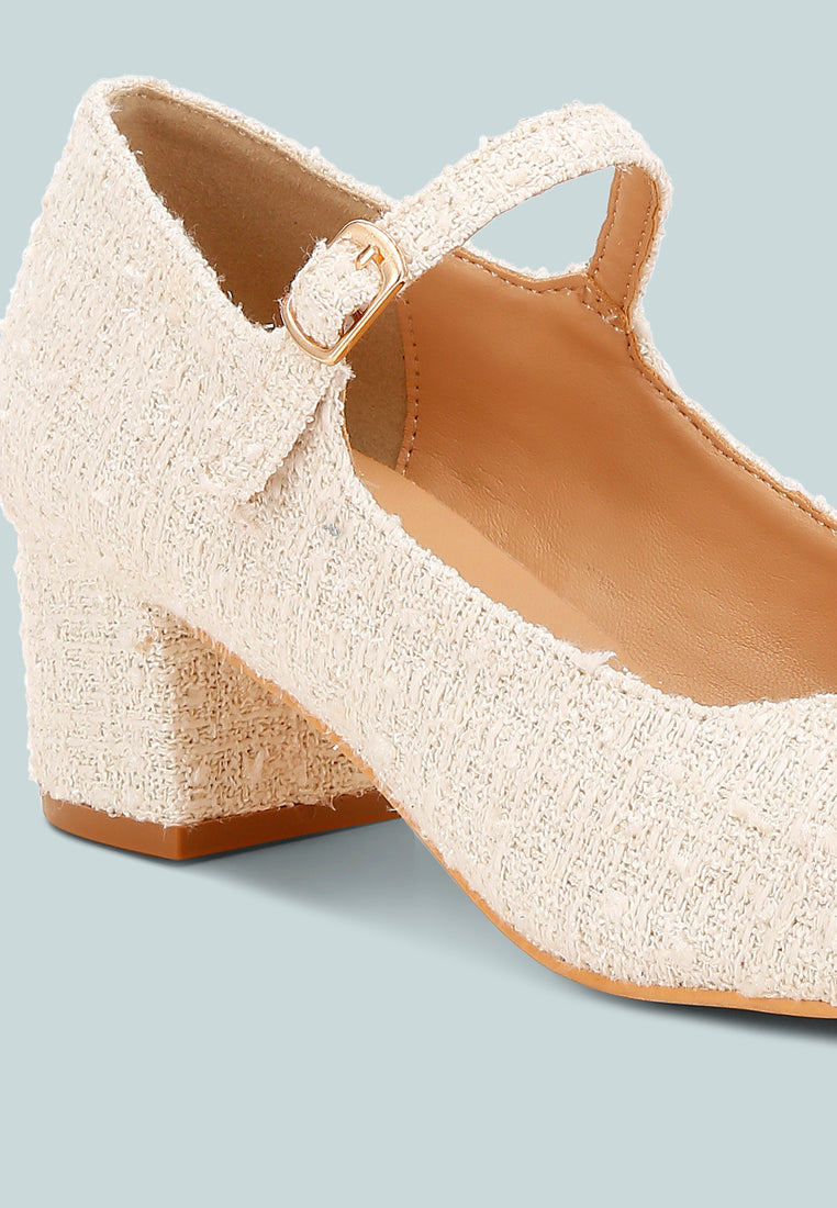 White Tweed Mary Jane Sandals by London Rag – Mary Jane sandals with a tweed fabric upper, ankle strap, and low block heel, sole and heel view