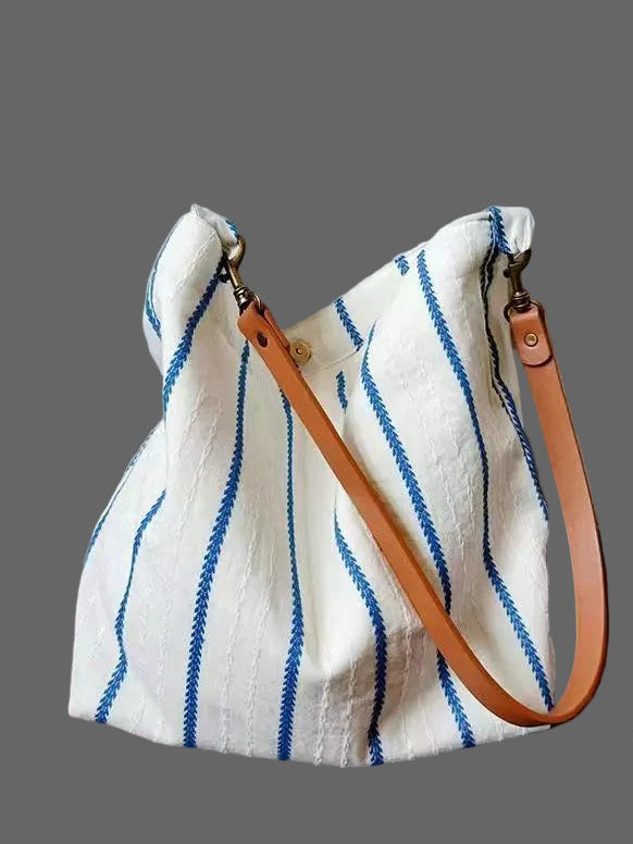 Daydream Stripe Tote - lifestyle shot styled as a summer shoulder bag